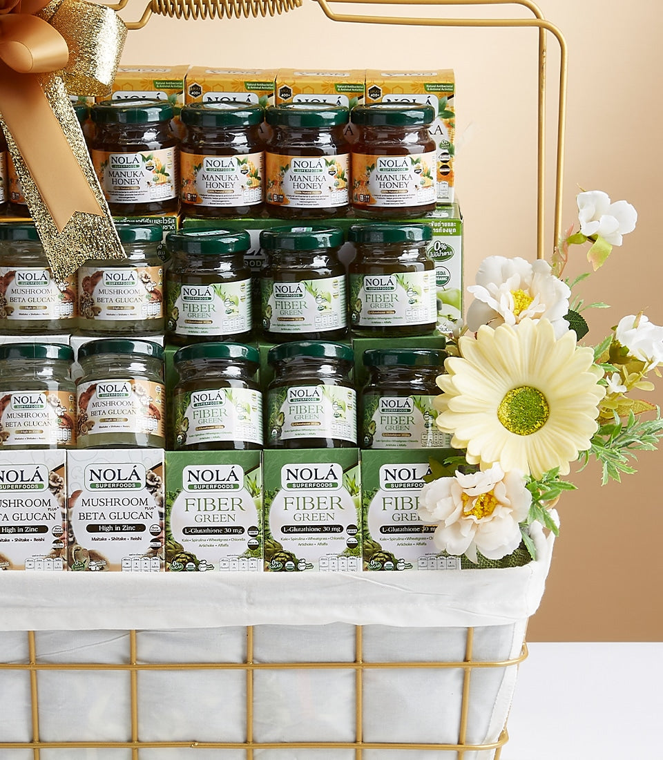 Luxury Nola Mixed wellness gift basket with manuka honey, mushroom beta glucan, and fiber supplements in gold wire frame