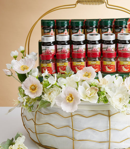 Luxury mixed delicacies gift basket with gourmet bottles and jars, white fabric-lined gold-frame design adorned with white