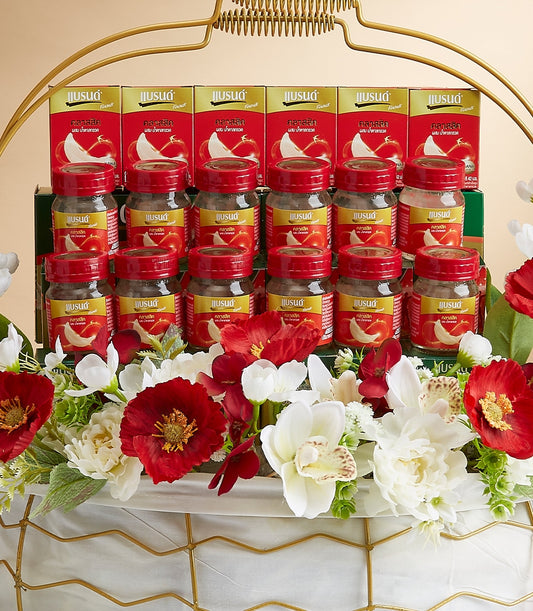 Premium red bird's nest wellness gift basket with golden weave, red and white artificial flowers, glass jars and boxed