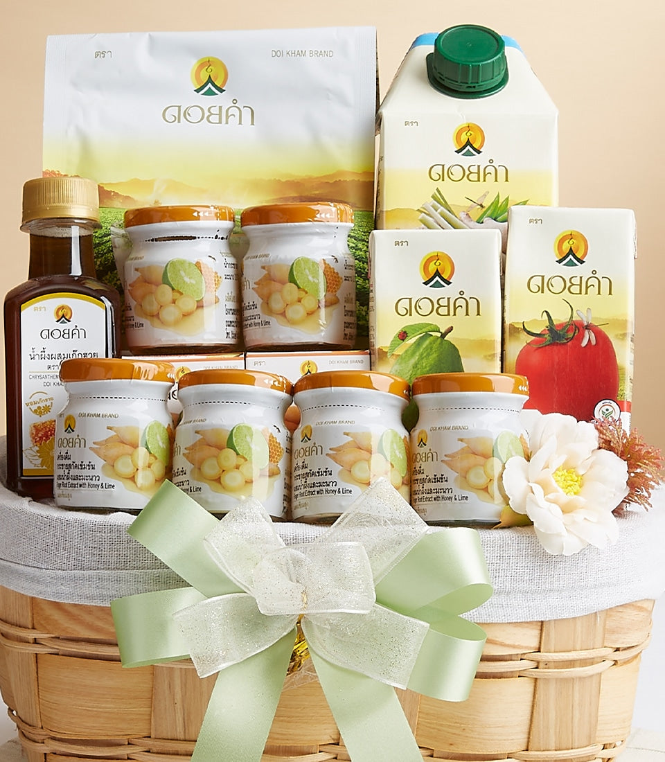 Timeless Mountain Medley Doi Kham gift basket with wellness products, white fabric lining, and light green bow