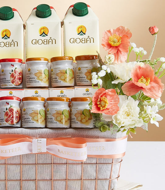 Luxury Doi Kham Highland gift basket with artisan Thai wellness products, pomegranate and ginger jars, peach poppies and