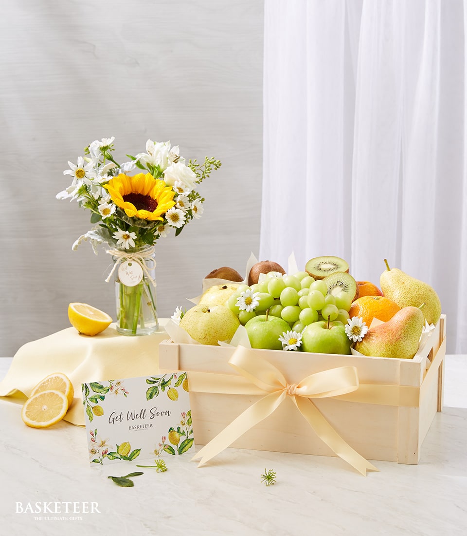 Harvest sunflower and fresh fruit get well gift set with yellow ribbon and white daisies