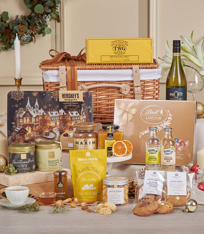 Luxury wicker hamper with French Earl Grey tea, Lindt chocolates, gourmet coffee, honey, cookies, and wine for New Year