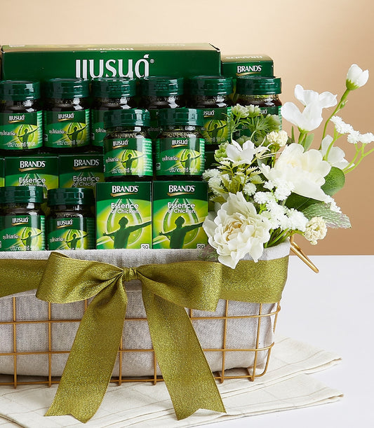 Premium chicken extract wellness gift basket with gold wire frame and white peonies