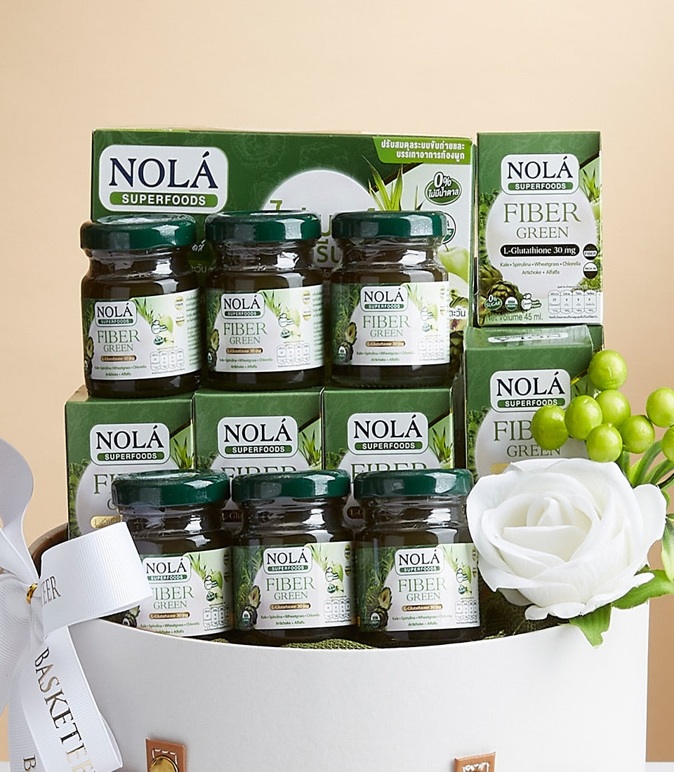 Green superfood fiber supplement gift basket with glass jars, artisan curated wellness set