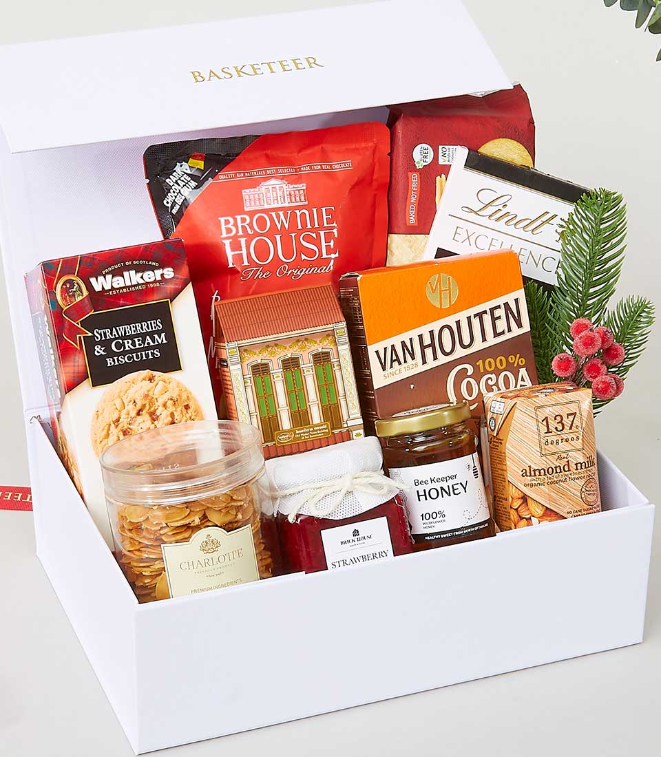 Delectable Indulgence white gift box with gourmet chocolates, brownies, biscuits, honey, jam, and artisan treats for New Year