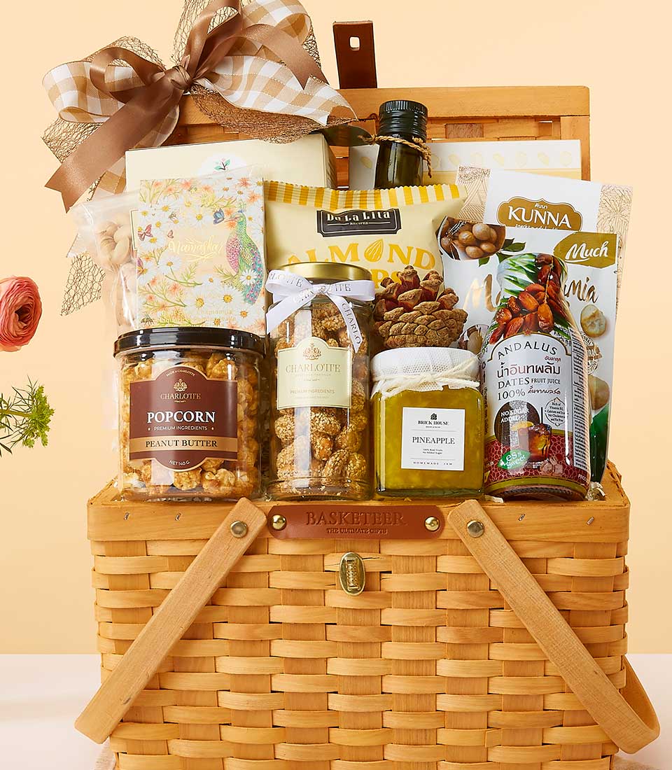 Globetrotter's Wellness Feast gourmet gift basket with peanut butter, nuts, and fruit spreads in woven wood with satin bow,