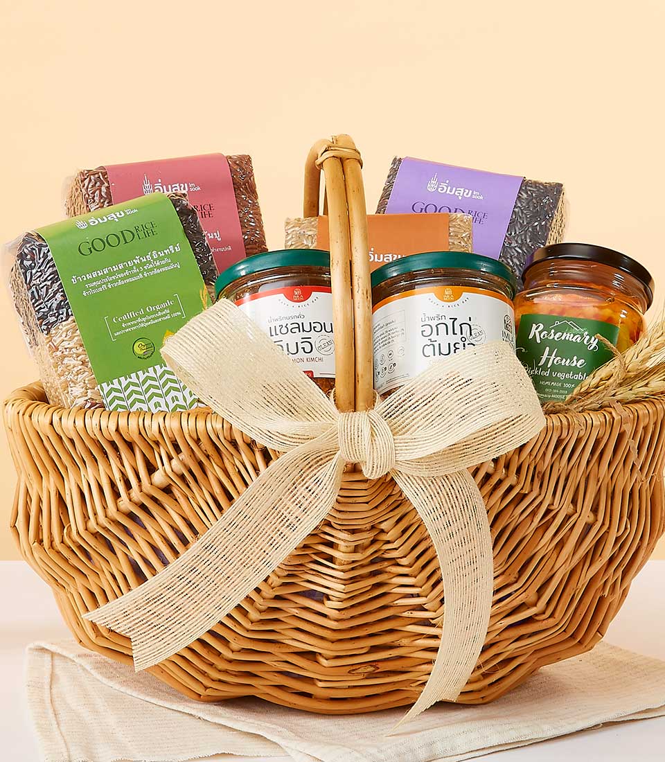 Woven gift basket with artisan grains and gourmet condiments for New Year wellness