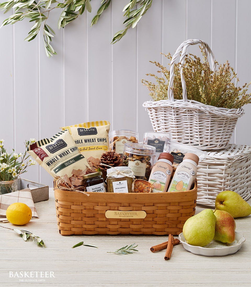 Nurturing Nature's Revival woven gift basket with whole wheat snacks, honey, preserves, and wellness drinks for get well