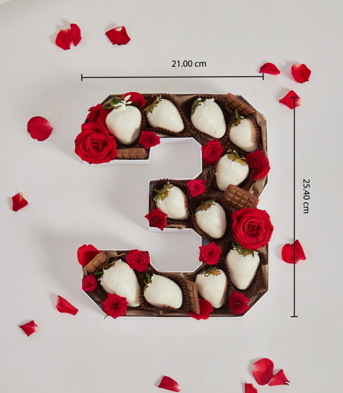 Number-shaped strawberry chocolate gift box with white chocolate-covered berries, chocolate wafers, and red roses for