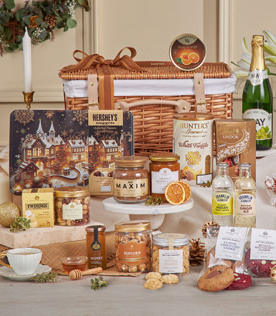 Luxury wicker gourmet hamper with artisan coffee, chocolates, and holiday treats for New Year gifting