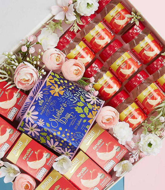 Premium bird's nest gift set with floral tea and artisan beverages for Mother's Day