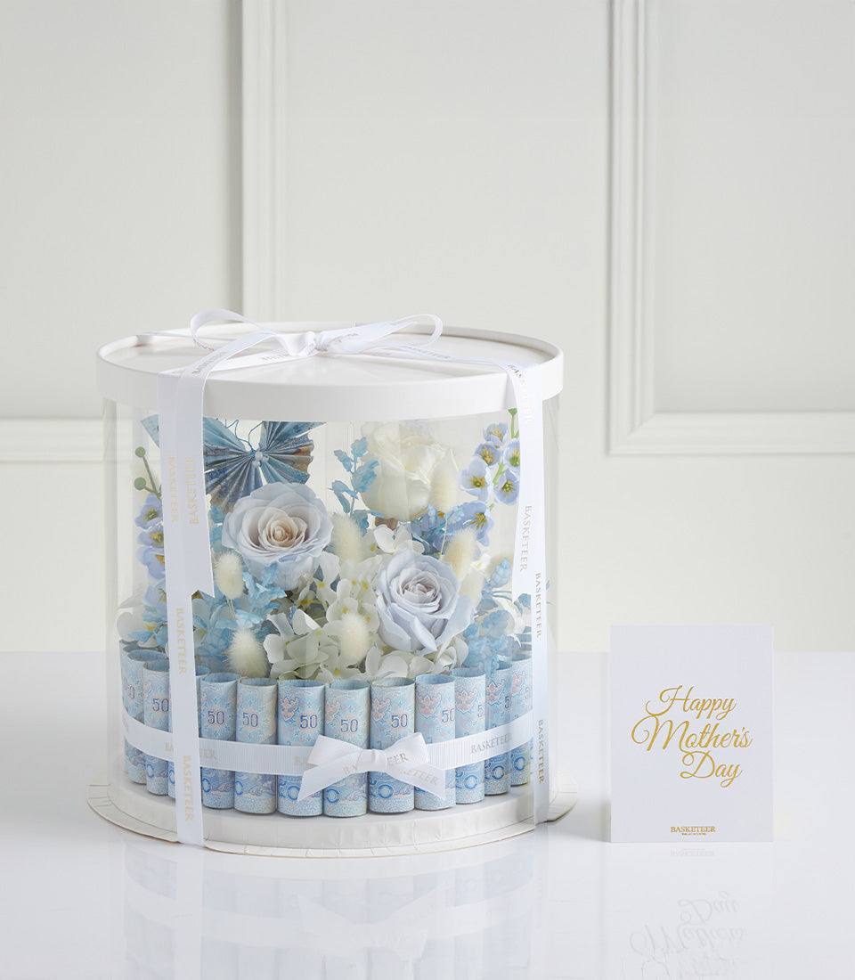Premium blue rose and currency bouquet in clear gift box, perfect Mother's Day present from Flowers by Basketeer