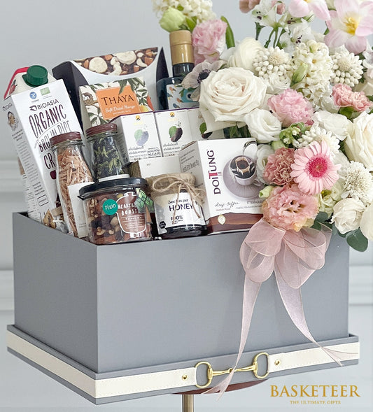 Sweet pink rose bouquet with gourmet health gift box, cream and grey luxury hamper with organic foods and honey