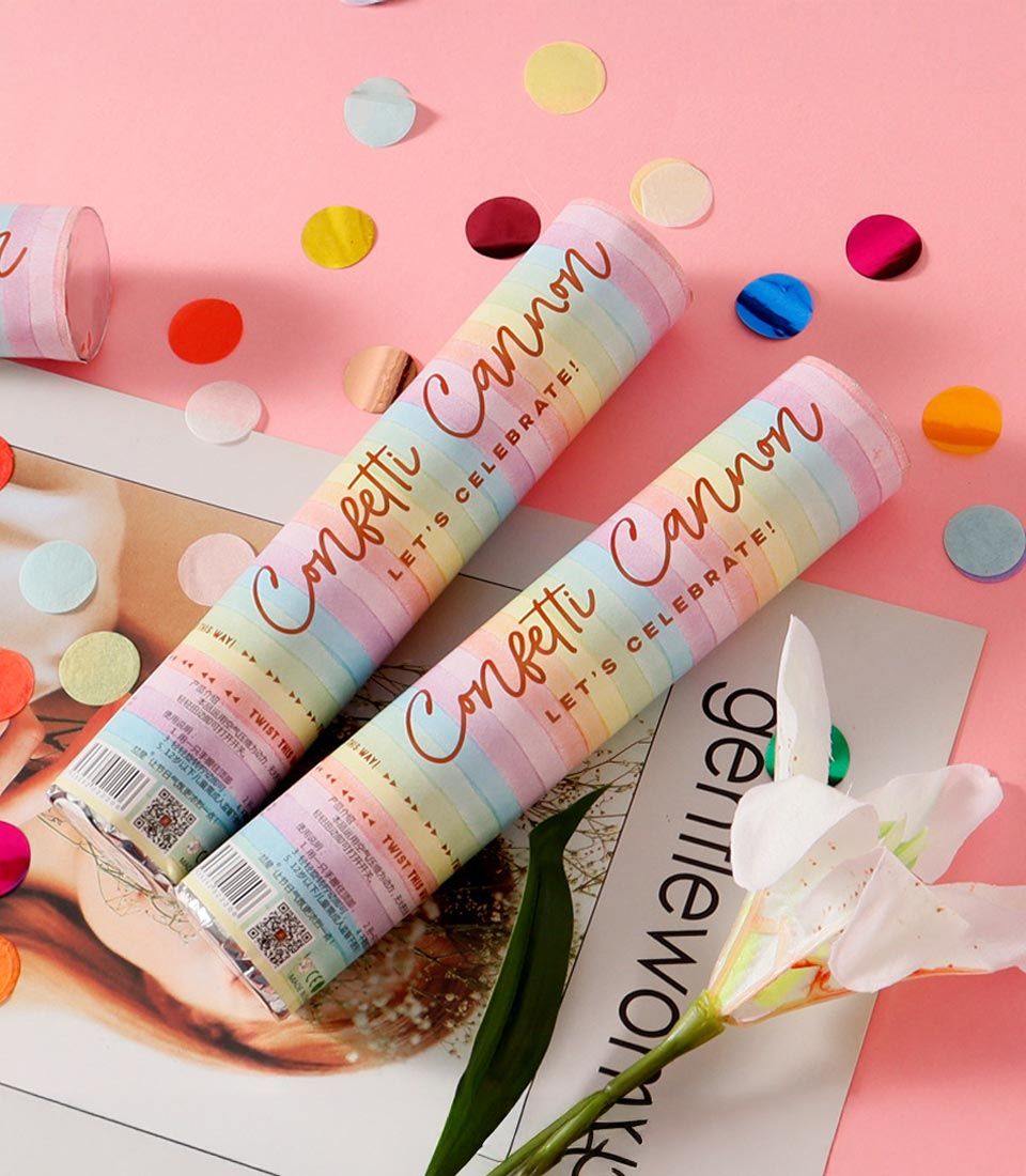 Rainbow pastel confetti cannons with scattered metallic confetti, party popper add-on for celebrations