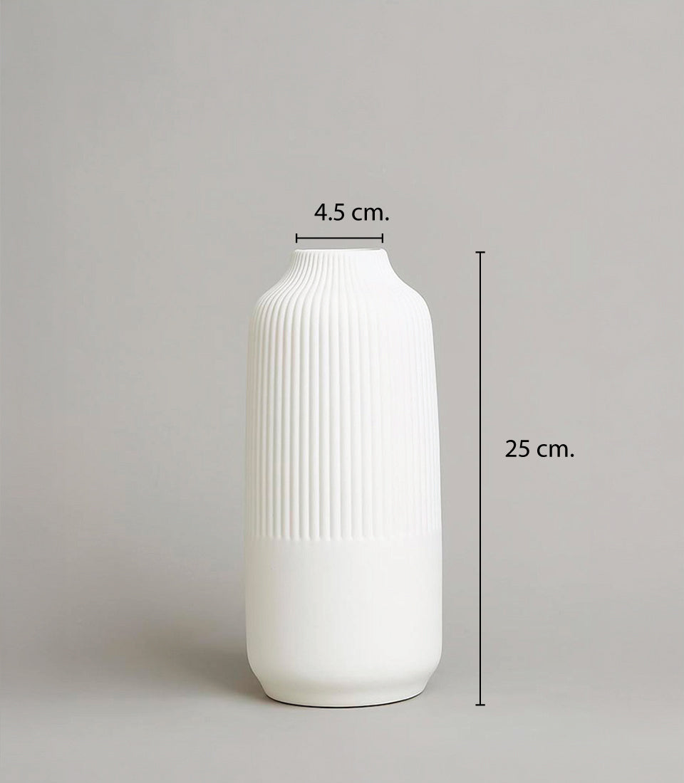 Tall white ceramic vase with ribbed texture and minimalist design for artificial orchids