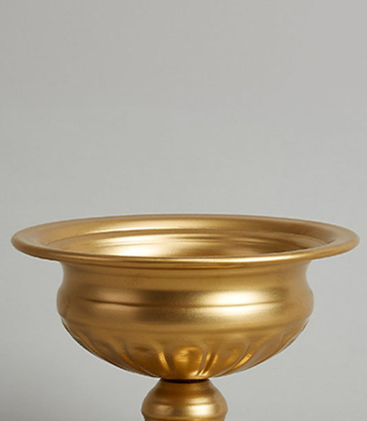 Golden pedestal bowl with fluted texture and gleaming metallic finish, luxury home décor gift