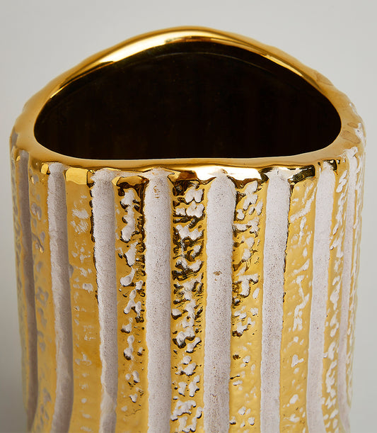 Gold and cream striped decorative vase with hammered metallic finish