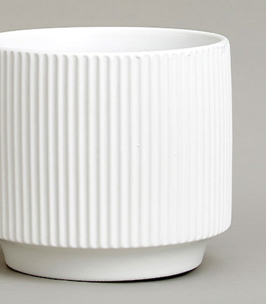 White ribbed ceramic vase with vertical fluting, perfect for fresh flowers or home décor gifting