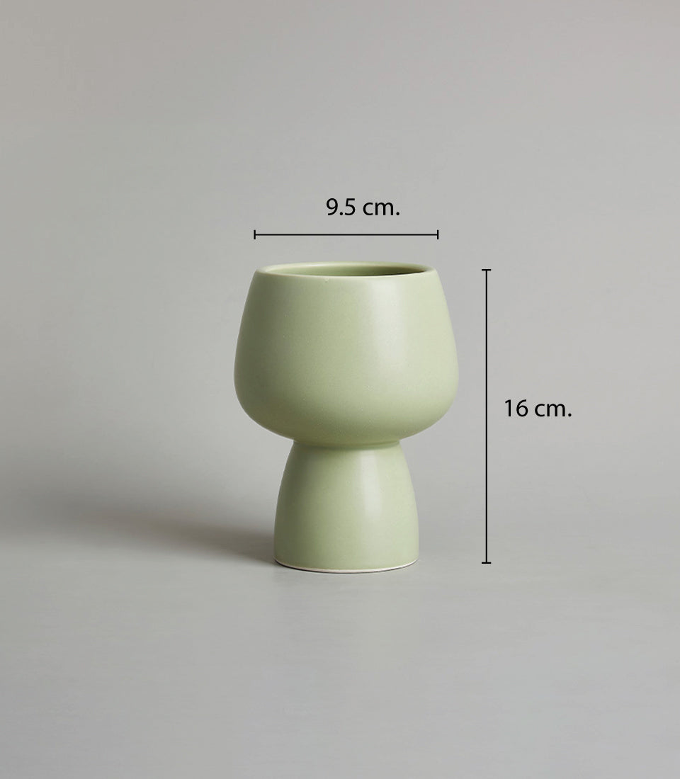 Light green ceramic vase with modern bulbous design, 16cm height, elegant home décor or gift vessel
