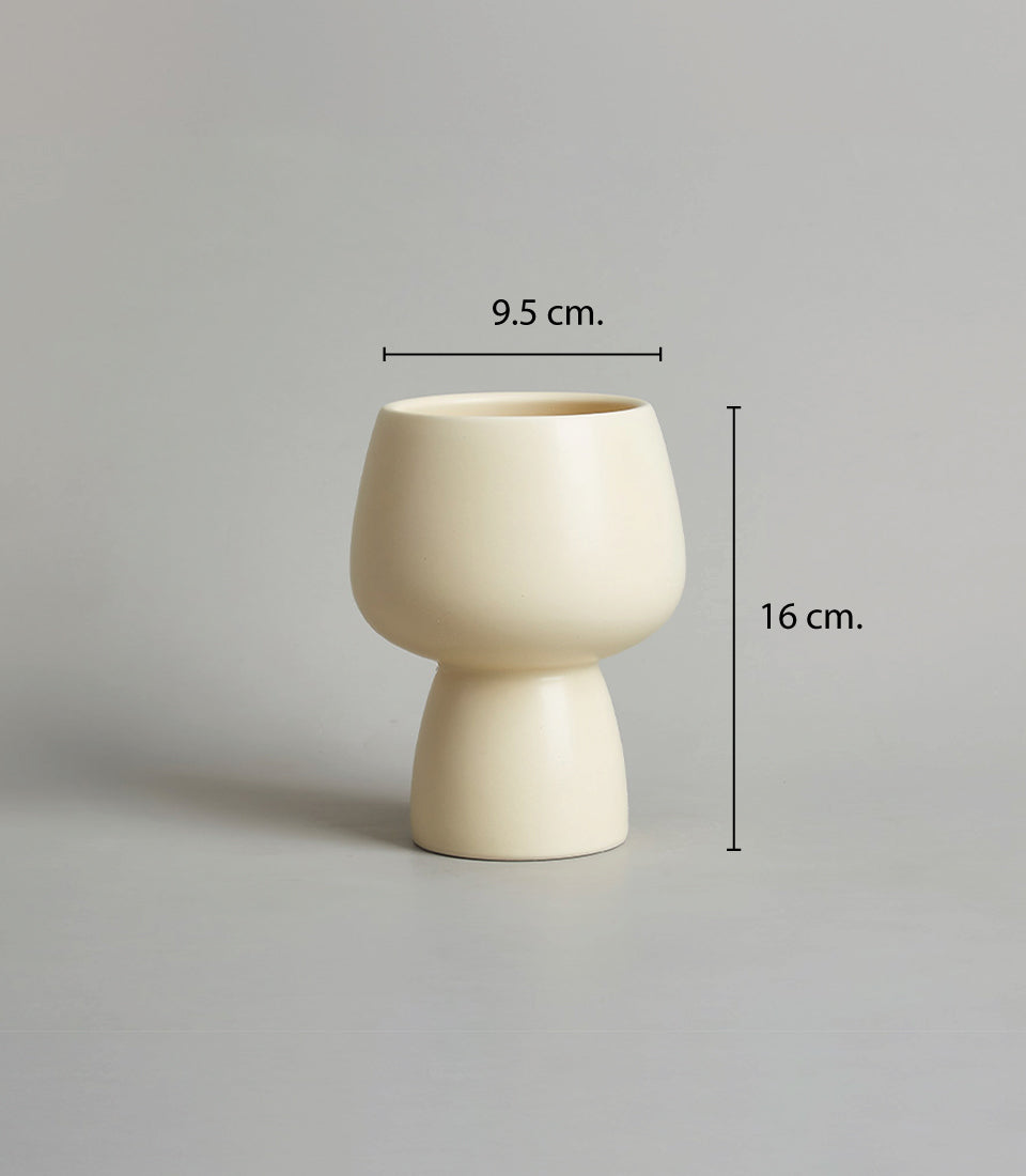 Cream ceramic chalice vase with modern rounded silhouette, 16cm height
