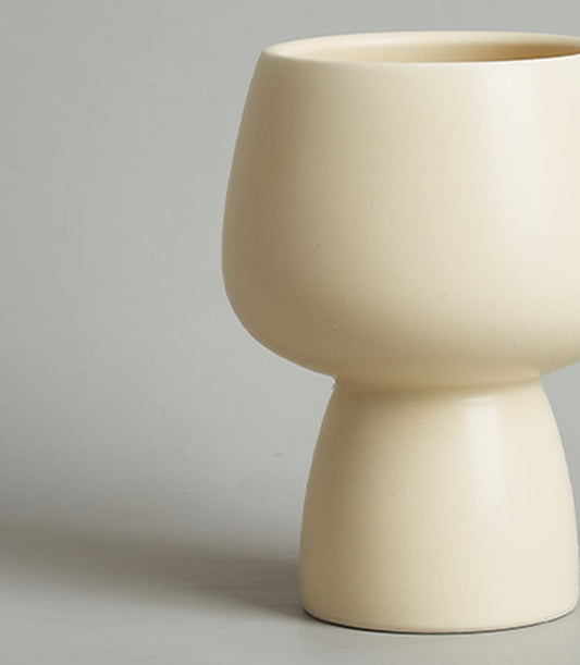 Cream ceramic modern chalice vase with tapered neck and rounded bulbous body, perfect for fresh flowers or standalone display