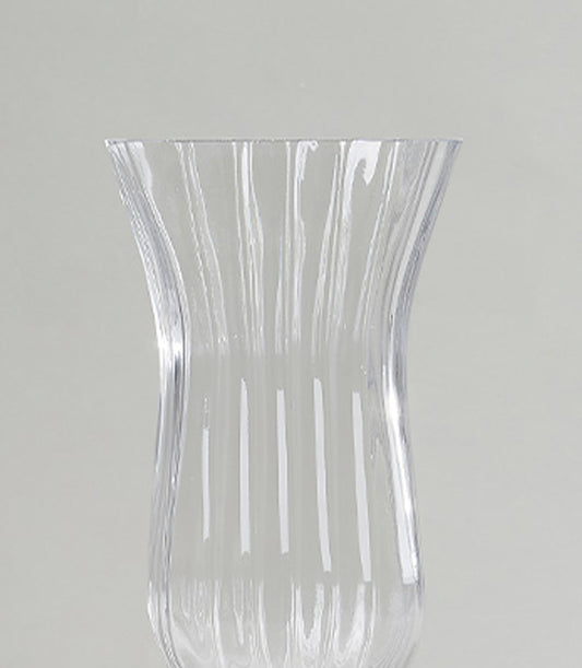 Pair of elegant ribbed glass vases with flared rims and organic curves, perfect for fresh flowers or luxury home decor