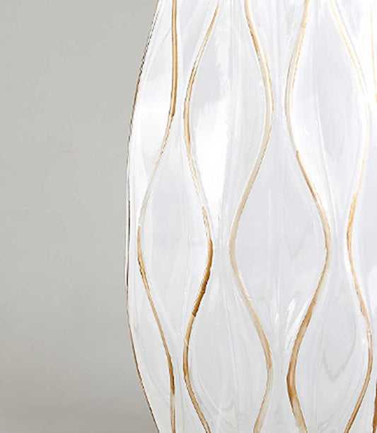 Elegant Ivory Waves vase from Flowers by Basketeer. Clear glass features soft, gold wave accents. Perfect for premium flower delivery in Bangkok.