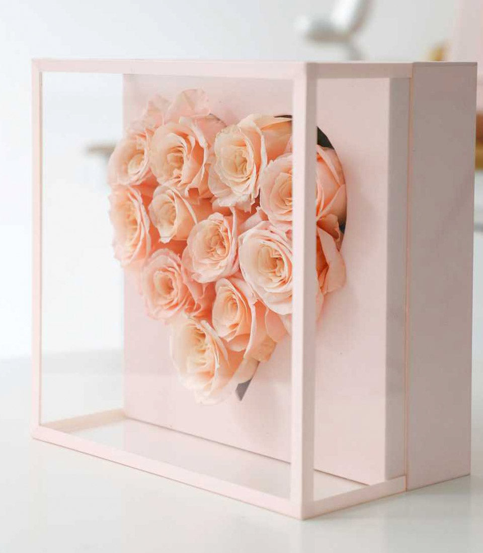 Blush preserved roses arranged in heart shape within clear display box, Flowers by Basketeer Valentine gift