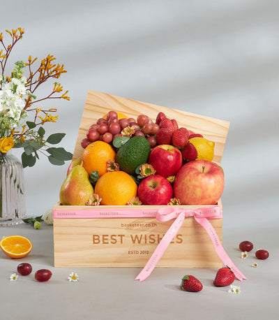 Premium fresh fruit wooden gift box with red grapes, strawberries, apples, oranges, and pear
