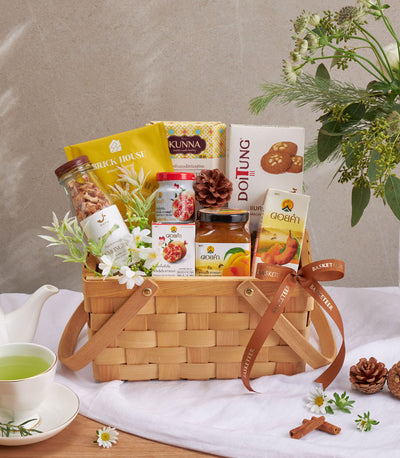 Premium wellness gift basket with herbal tea set, artisan jams, and Thai gourmet snacks