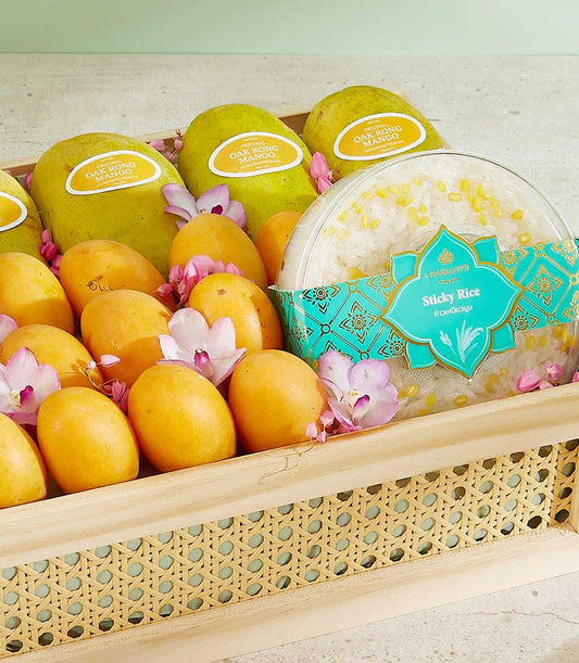 Premium Thai mango and sticky rice gift tray with orchids, wooden rattan basket