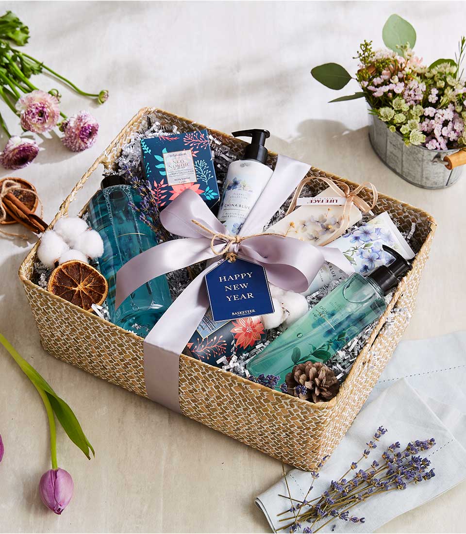 Luxury spa gift basket with bath products, natural fibers, and satin ribbon for Mother's Day pampering