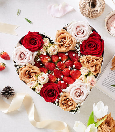 Heart-shaped gift box with fresh roses, strawberries, and baby's breath for birthdays and celebrations