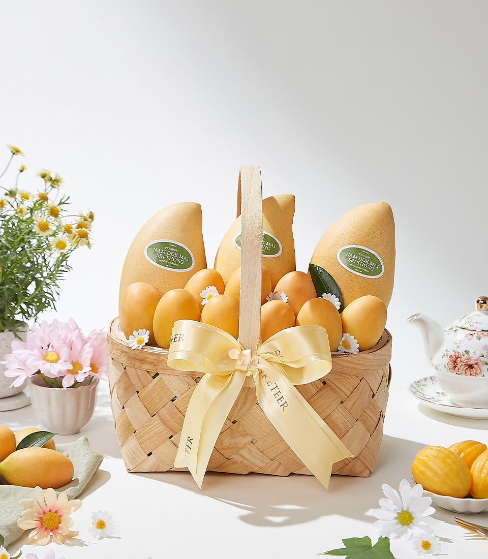 Premium Nam Dok Mai mango gift basket with Mayongchid varieties, woven light brown basket with yellow satin bow