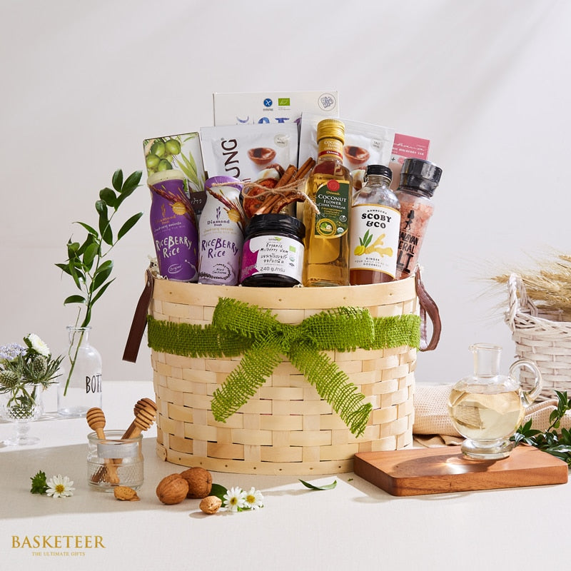 Artisan Thai gourmet gift basket with riceberry rice drinks, organic mulberry jam, coconut flower vinegar, kombucha, and