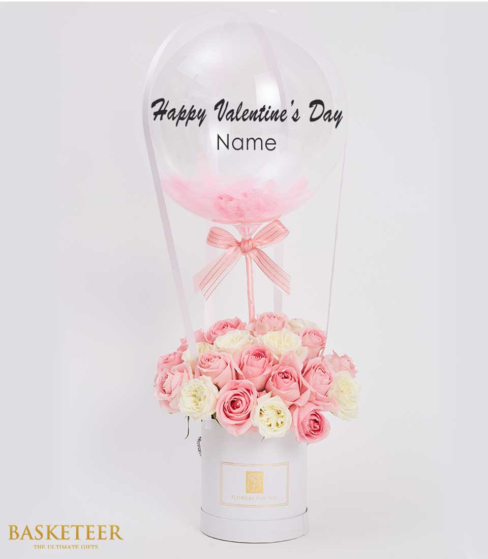 Pink rose bouquet in white box with hot air balloon decoration and personalized Valentine's Day message