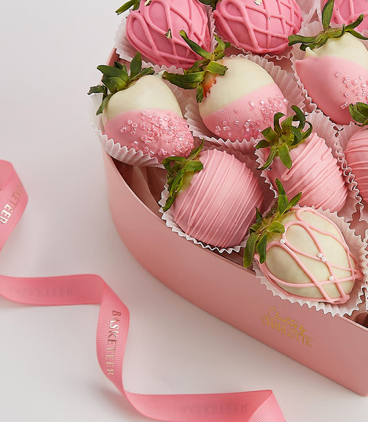 Heart-shaped box of pink and white chocolate-covered strawberries with gold leaf and sprinkles, Valentine's Day gift