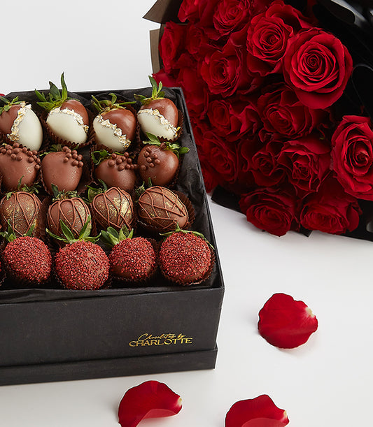 Luxury Valentine's gift set with chocolate-covered strawberries and premium red rose bouquet