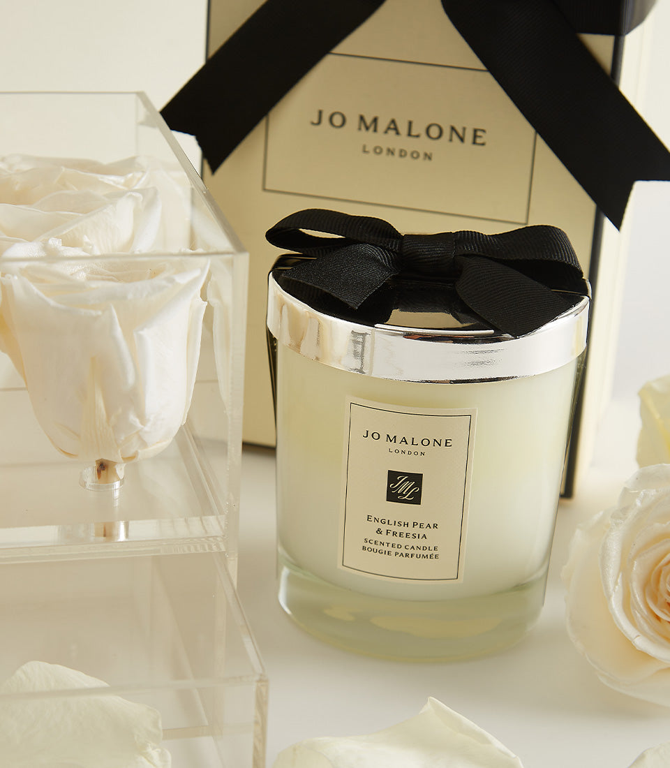 Luxury Valentine's gift set with preserved white roses, English Pear & Freesia scented candle, and Jo Malone London fragrance