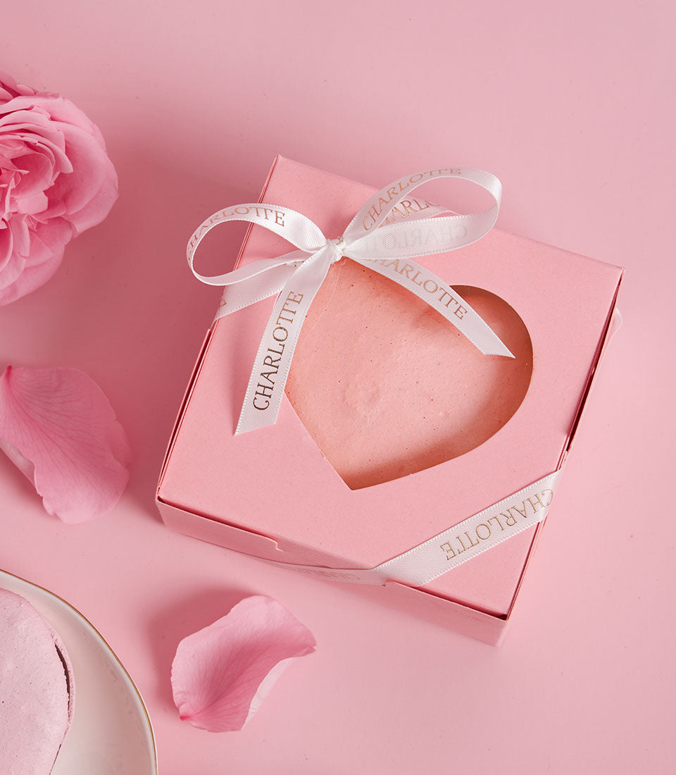 Pink heart-shaped cookies in luxury gift box with Charlotte Bakery ribbon, Valentine's Day treat with fresh rose petals