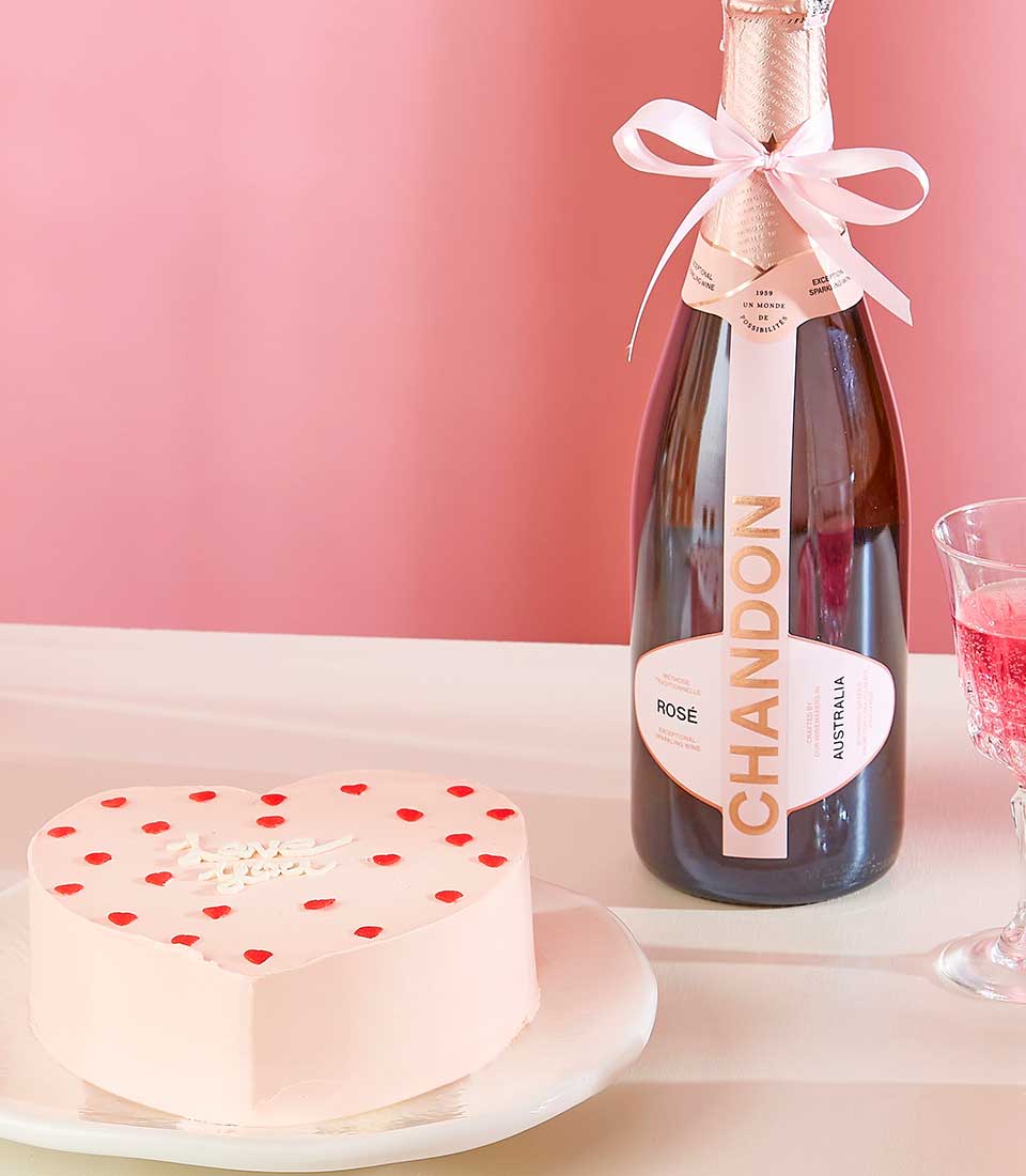 Heart-shaped pink velvet cake with rosé sparkling wine gift set for Valentine's Day