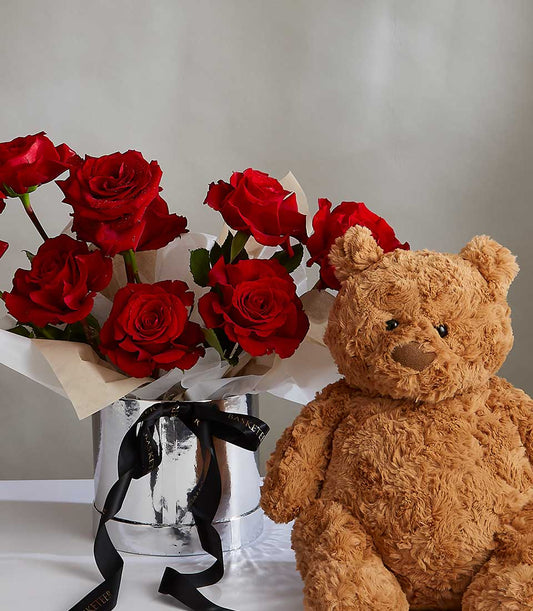 Ruby red roses with brown teddy bear in silver vase, Valentine's Day gift combo