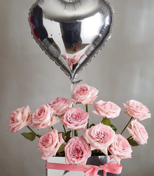Light pink roses with heart balloon in silver box, romantic Valentine's gift for her