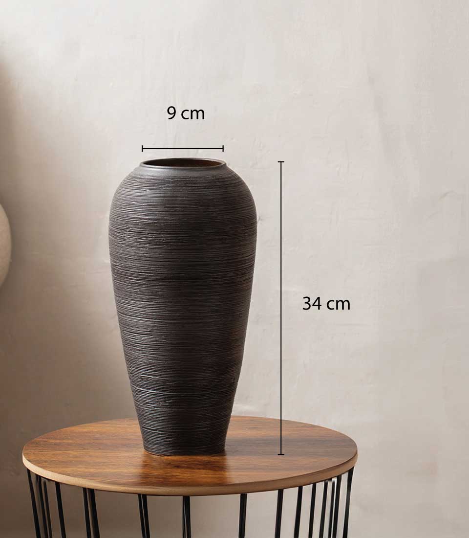 Elegant textured black vase from Flowers by Basketeer, perfect for premium flower delivery in Bangkok. A simple yet stylish vase for your rose bouquet Thailand.
