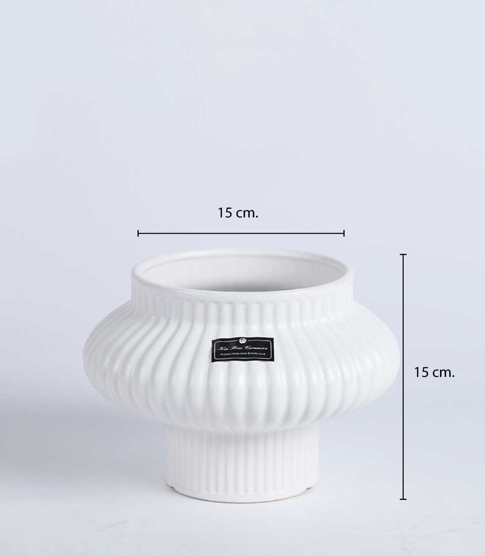 White ceramic fluted vase with tapered neck, premium gift-ready design