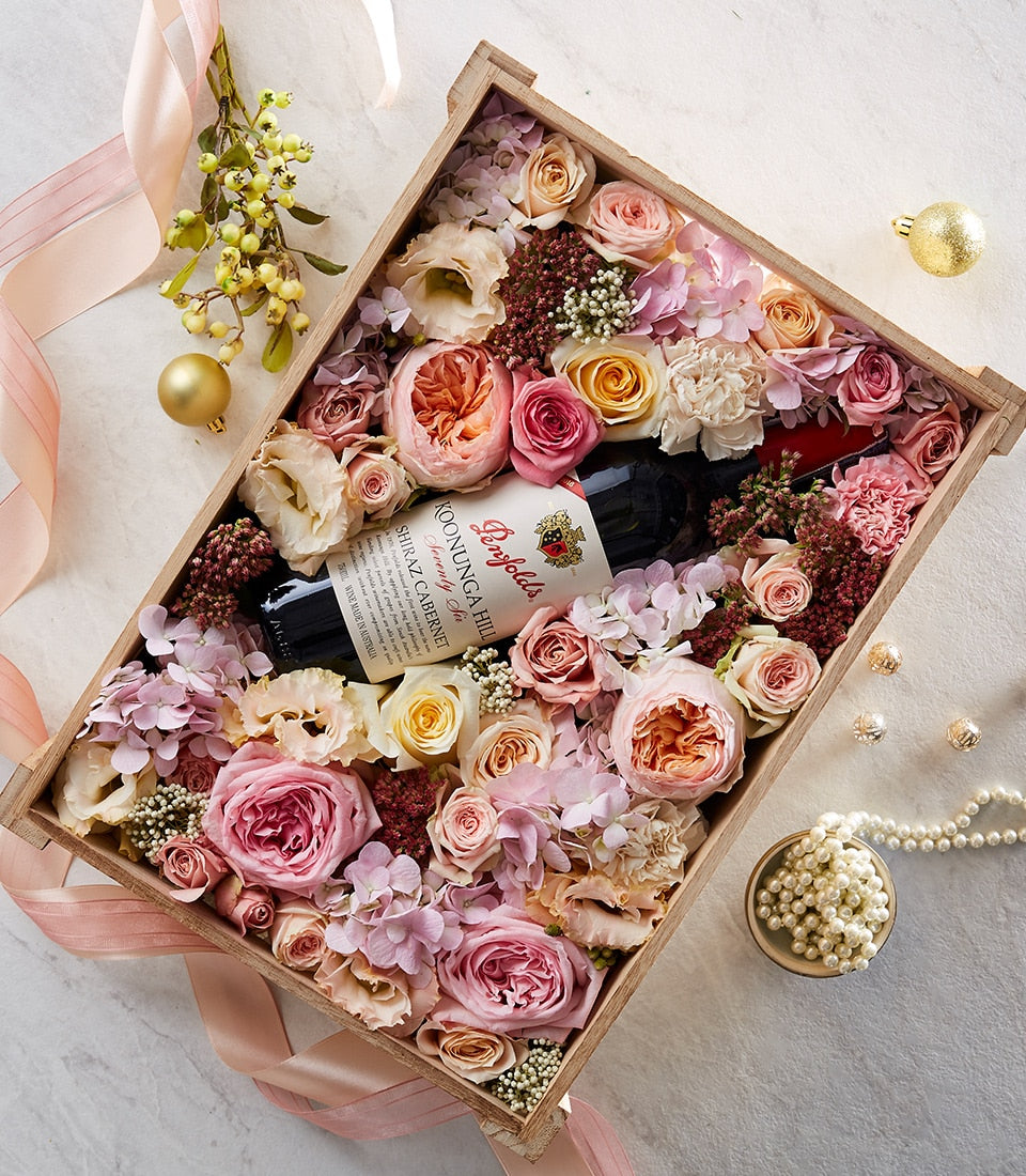 Premium red wine and fresh roses gift box with pink hydrangeas, perfect for Valentine's Day romance