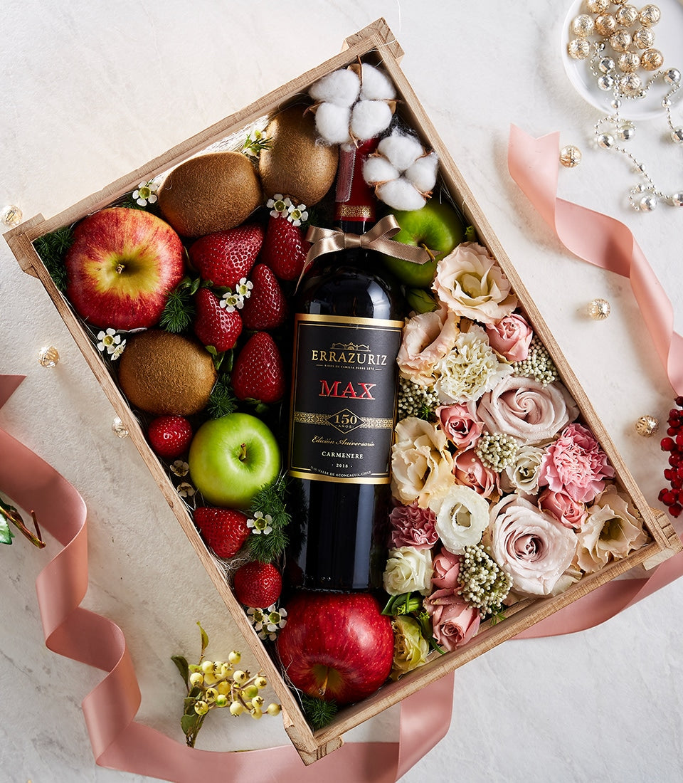 Premium wooden gift box with Errazuriz red wine, fresh fruit, strawberries, and pink rose arrangement with satin ribbon