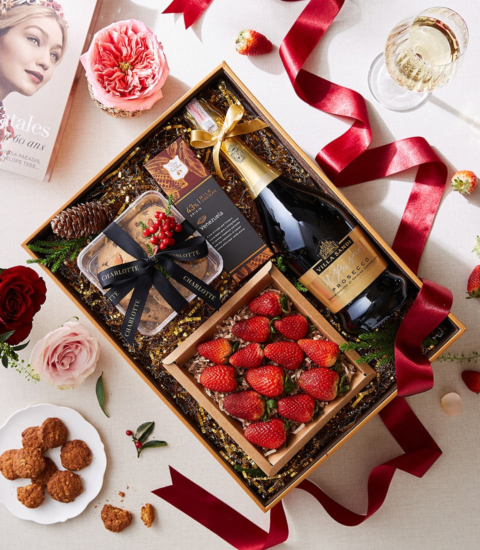 Luxury Prosecco gift box with fresh strawberries, Venezuelan chocolate, and gourmet cookies with red roses