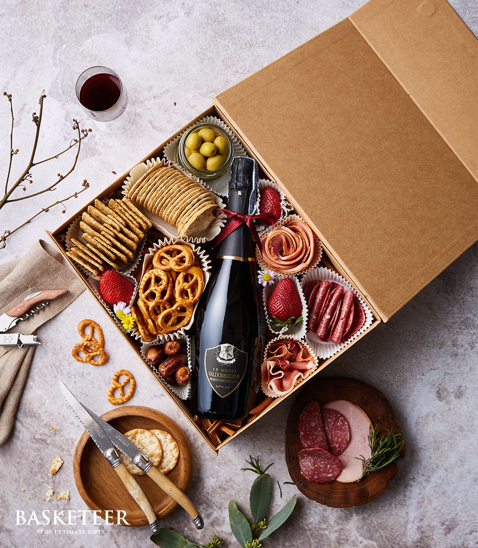 Madie Prosecco & Charcuterie Bliss Box with sparkling wine, cured meats, olives, crackers, and gourmet accents
